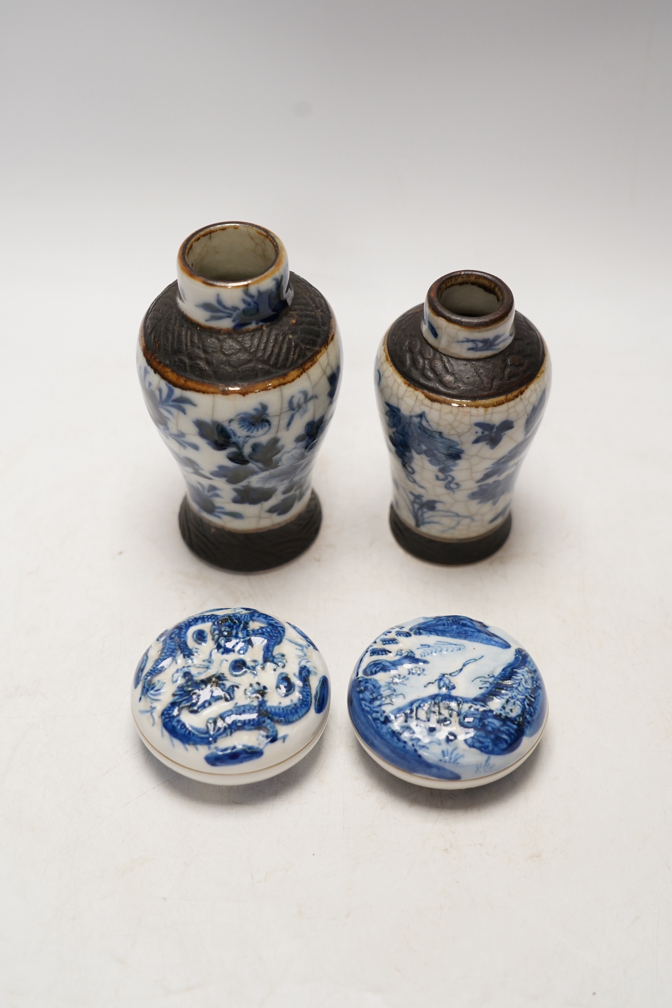 Chinese blue and white ceramics comprising crackle glaze vases and circular seal pots (4). Condition - fair to good, a few minor chips